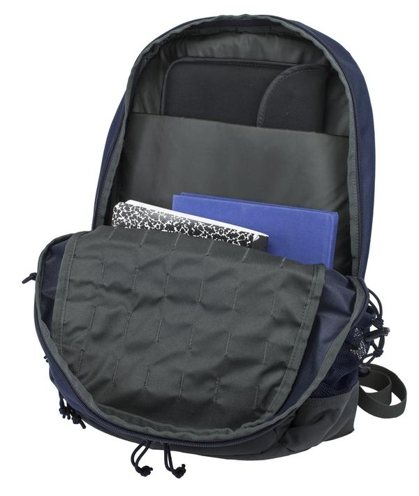 Open black Elite Survival Systems Echo EDC Backpacks 7721-TR with books and a notebook visible in the main compartment, isolated on a white background.