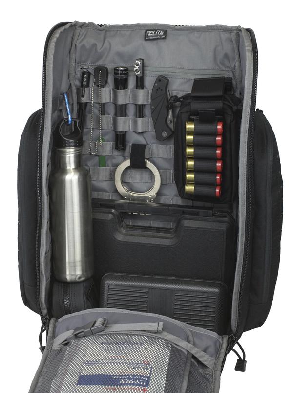 Open Elite Survival Systems Tenacity-72 Three Day Support/Specialization backpack displaying items such as a water bottle, binoculars, flashlight, multitool, ammunition, and other survival gear.