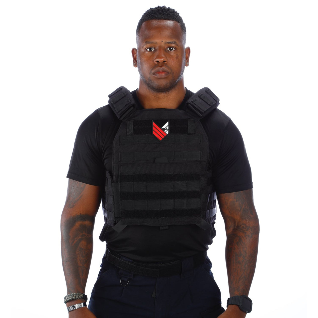 A man wearing a Body Armor Direct Advanced Body Armor Plate Carrier with Cummerbund posing in front of a white background.