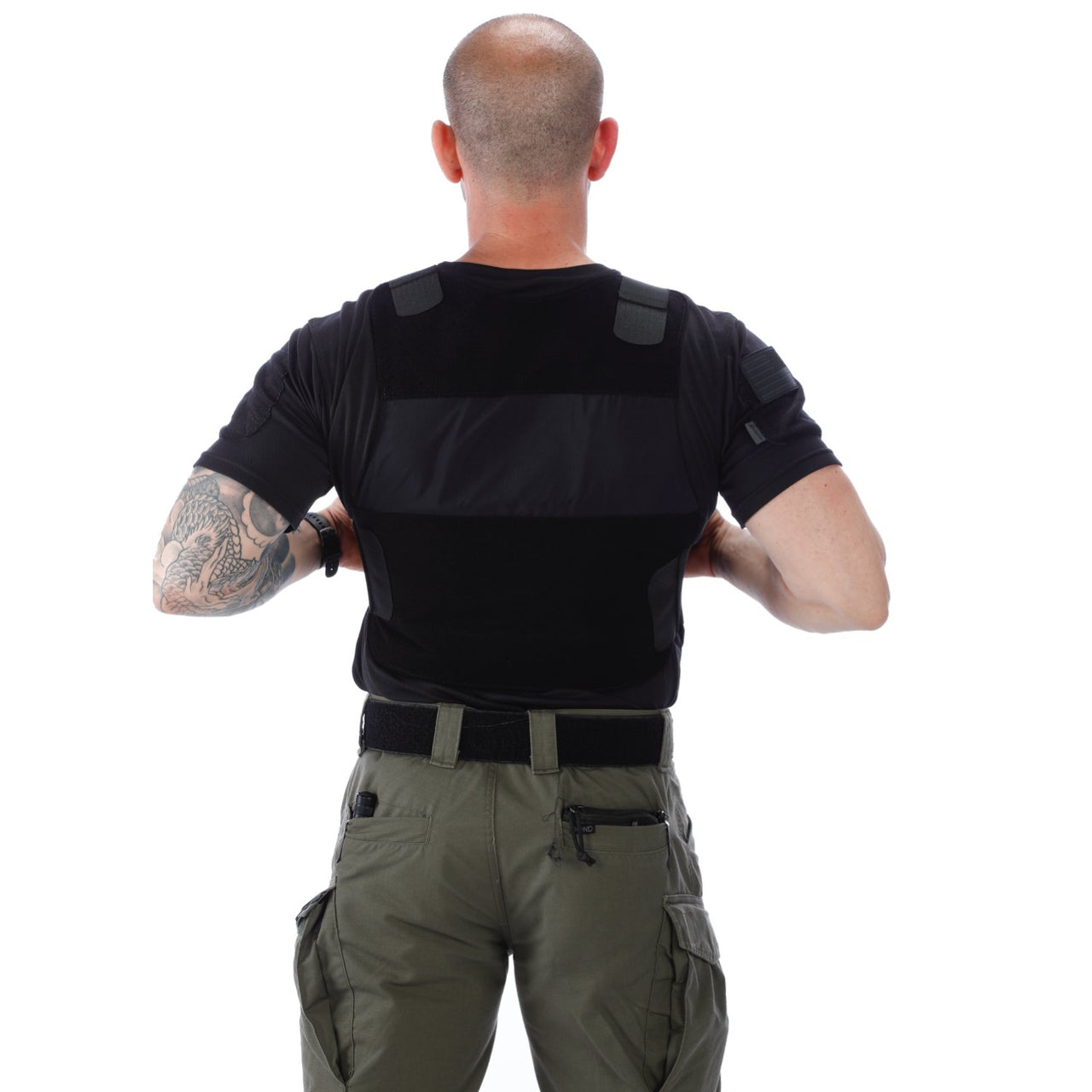 The back view of a man wearing a Body Armor Direct All American Concealable Enhanced Multi-Threat Vest.