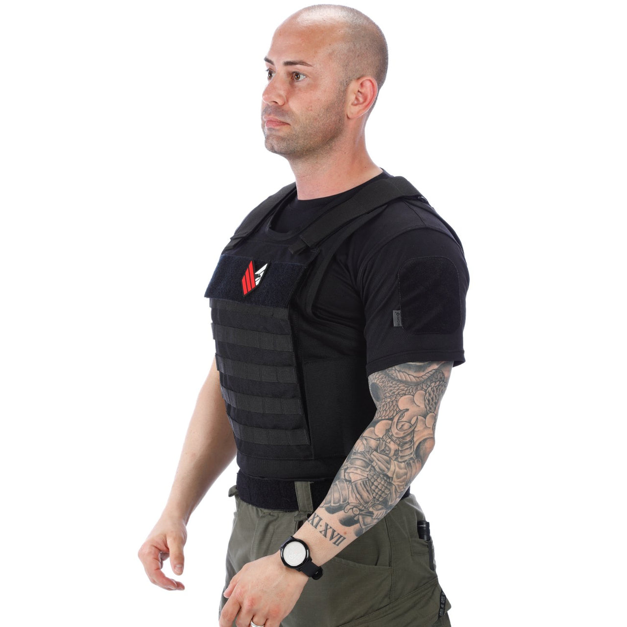 A man wearing a Body Armor Direct All Star Tactical Enhanced Multi-Threat Vest.