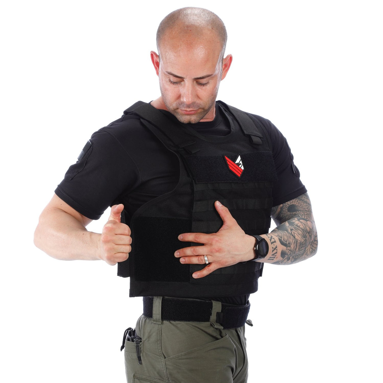 A man wearing a Body Armor Direct All Star Tactical Enhanced Multi-Threat Vest with a thumbs up.