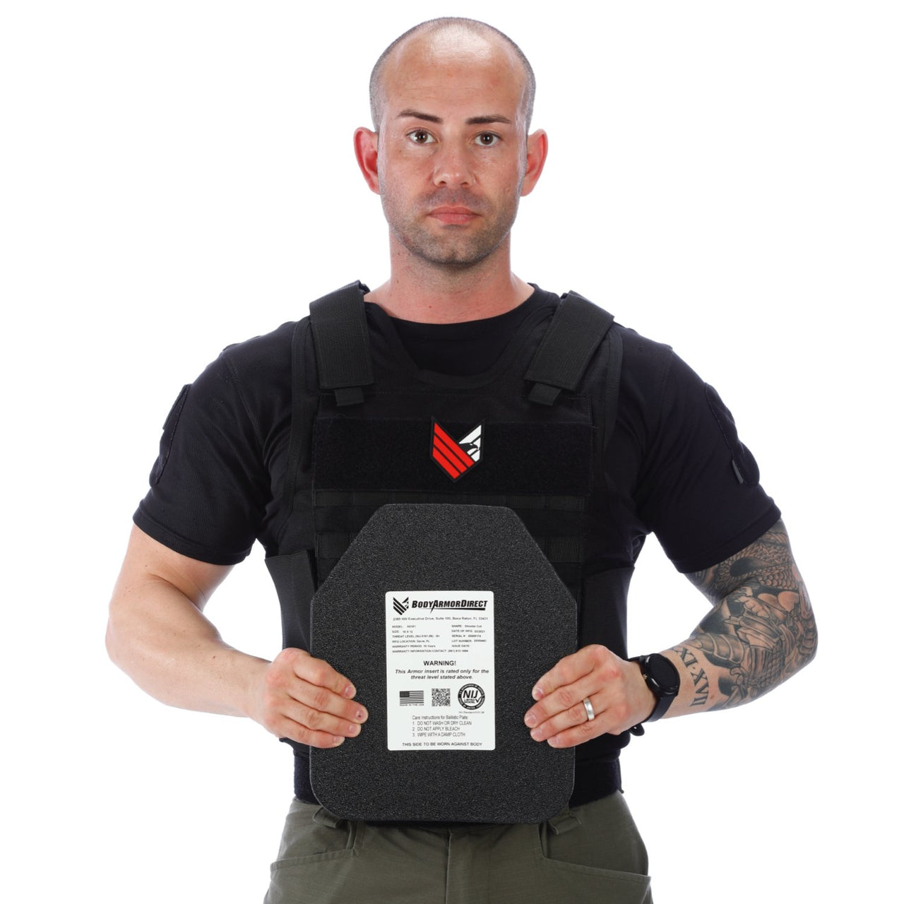 A man holding a Body Armor Direct All Star Tactical Enhanced Multi-Threat Vest, made by Body Armor Direct, in front of a white background.