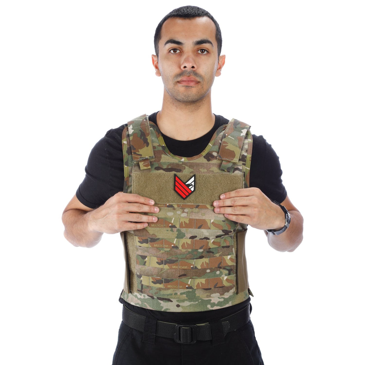 A man holding a Body Armor Direct All Star Tactical Enhanced Multi-Threat Vest in front of a white background.