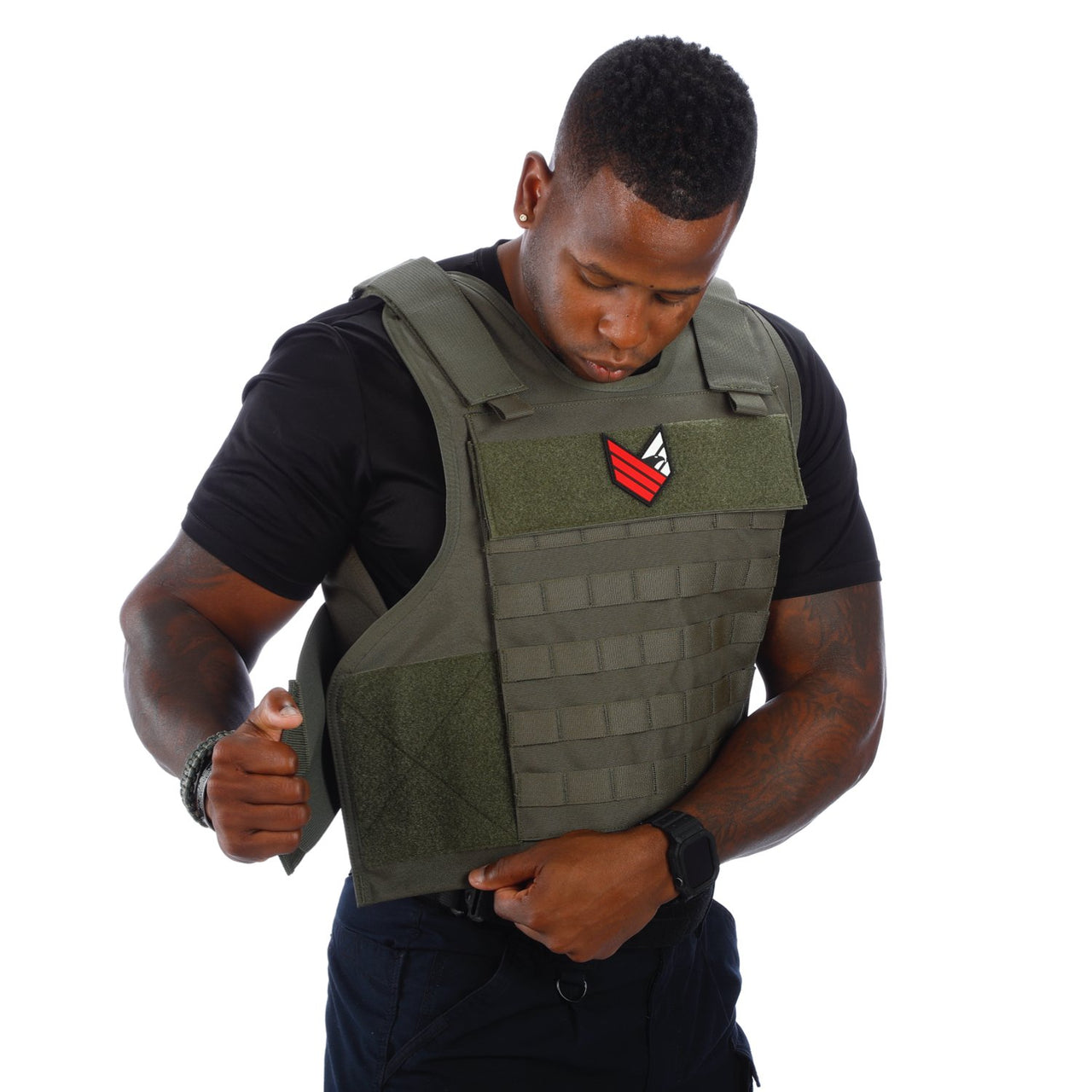 A man wearing a green Body Armor Direct All Star Tactical Enhanced Multi-Threat Vest.