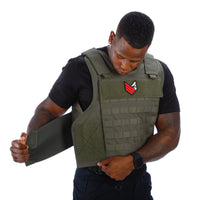 Thumbnail for A man wearing a green Body Armor Direct All Star Tactical Enhanced Multi-Threat Vest.