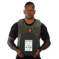 Thumbnail for A man holding a Body Armor Direct All Star Tactical Enhanced Multi-Threat Vest in front of a white background.