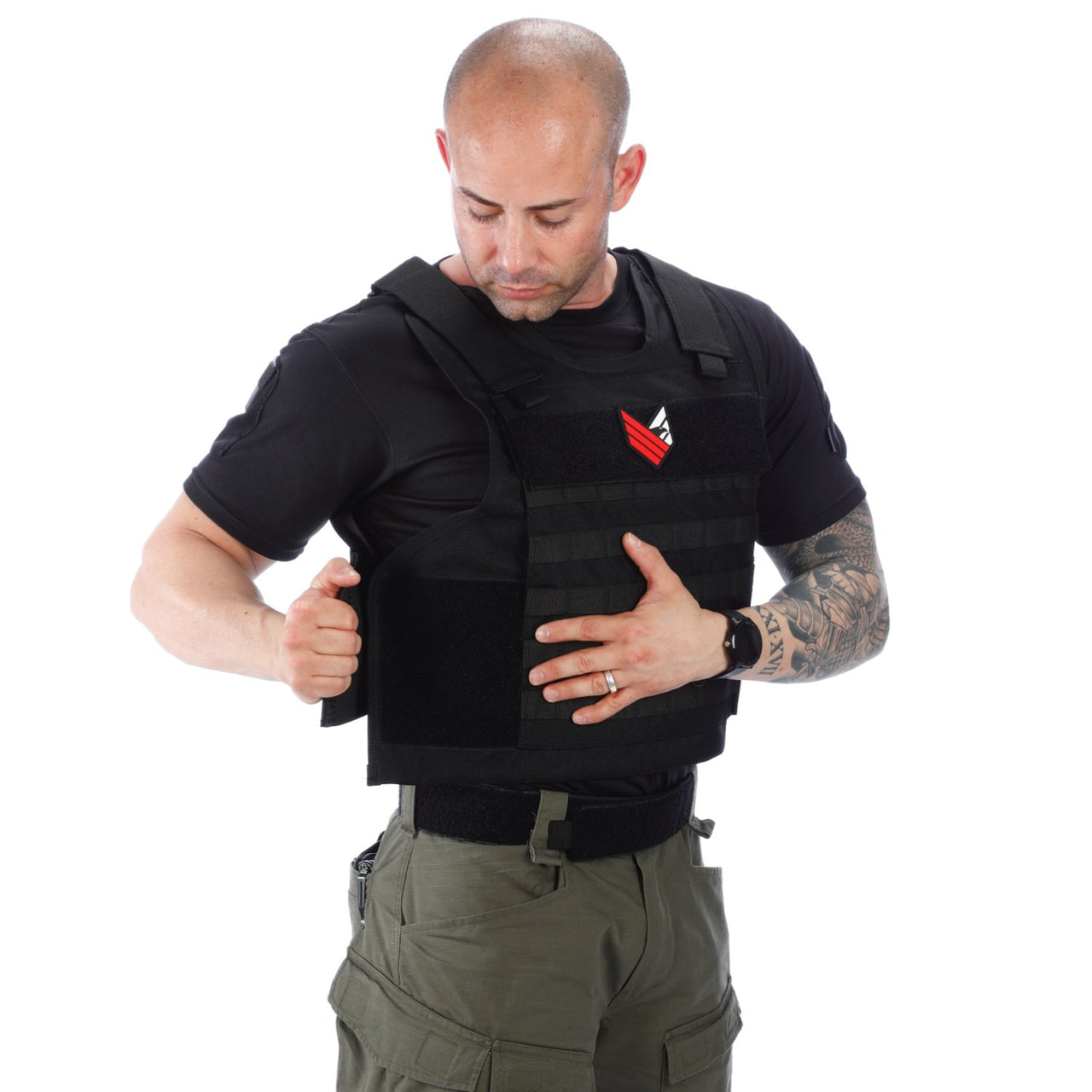 A man wearing the Body Armor Direct All Star Tactical Enhanced Multi-Threat Vest by Body Armor Direct on a white background.