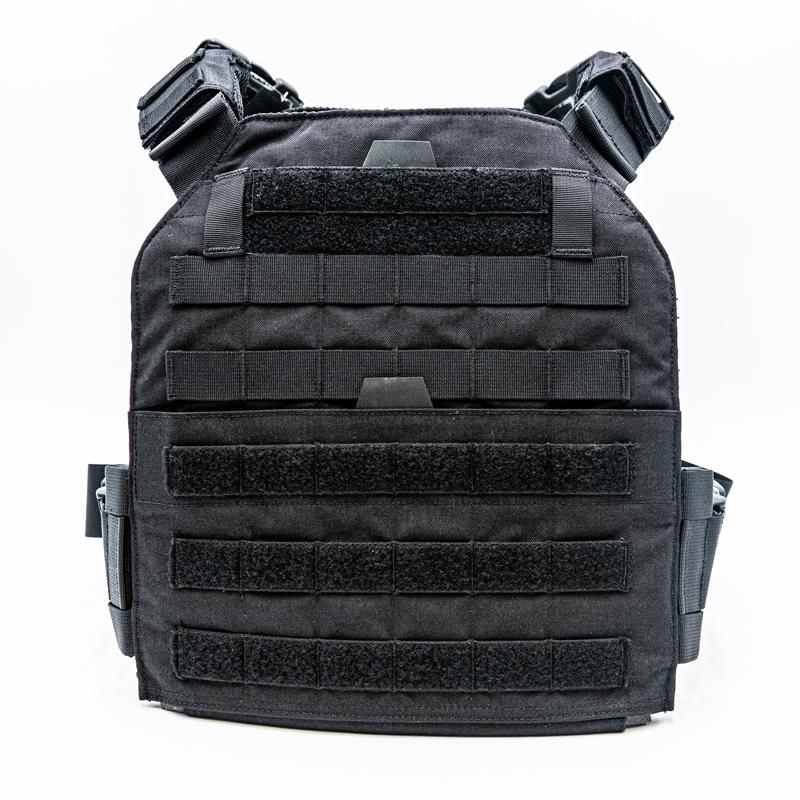 Black National Body Armor Plate Carrier with multiple rows of molle webbing, front fastening, and shoulder adjustments, isolated on a white background.