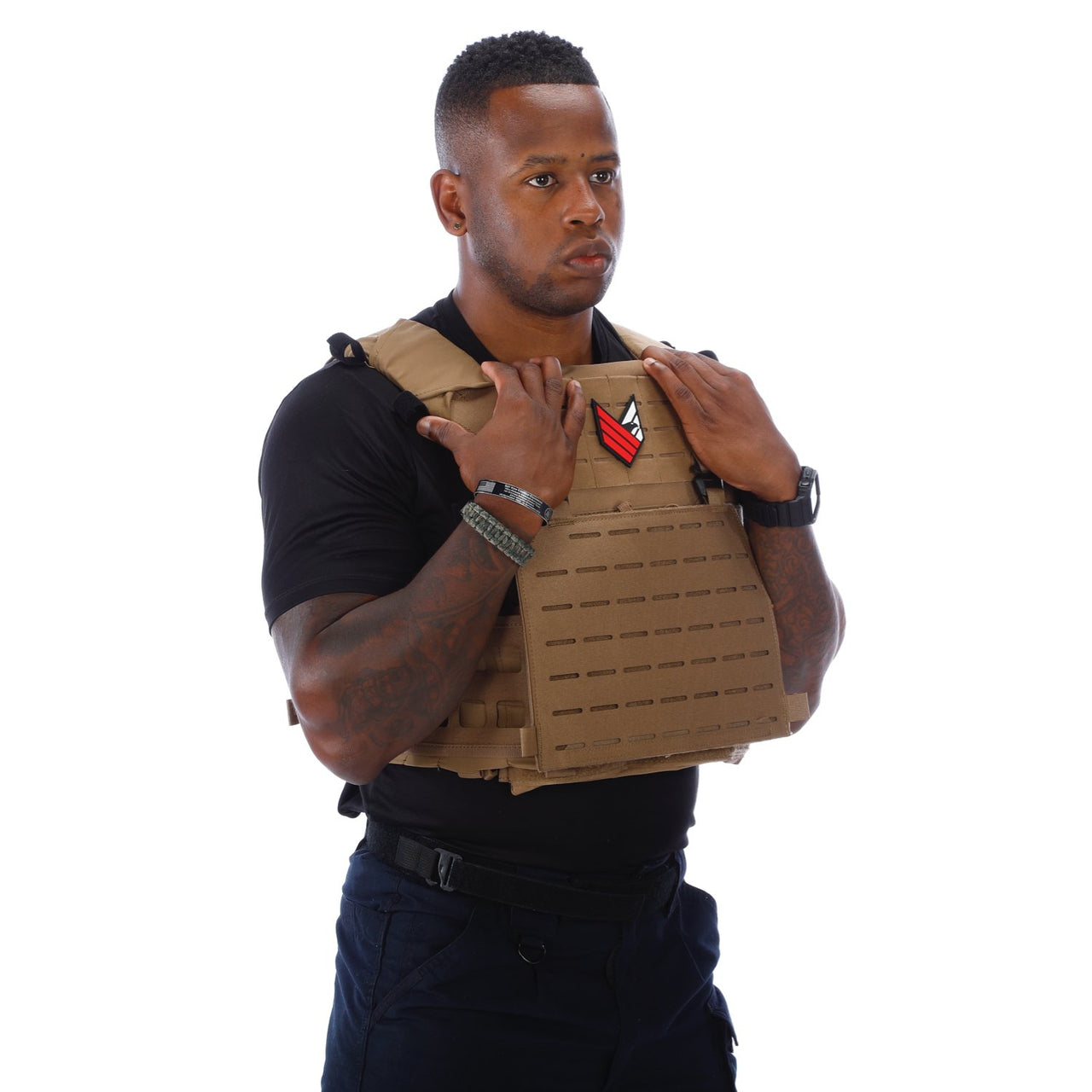 A man wearing a Body Armor Direct Expert Plate Carrier on a white background.