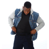 Thumbnail for A black man wearing a Body Armor Direct VIP T-Shirt Concealable Enhanced Multi-Threat denim jacket and jeans.