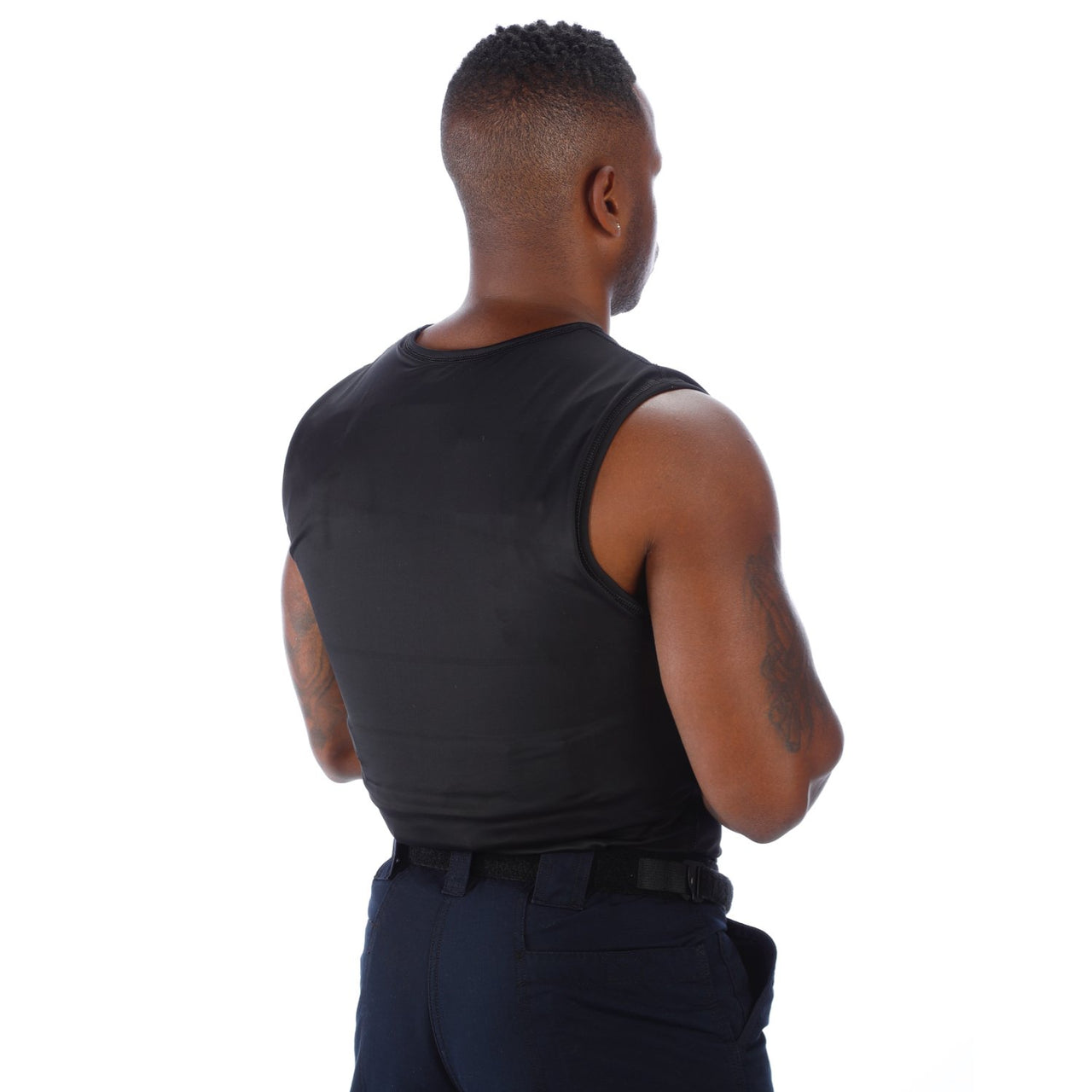 The back of a man wearing a Body Armor Direct VIP T-Shirt Concealable Enhanced Multi-Threat.