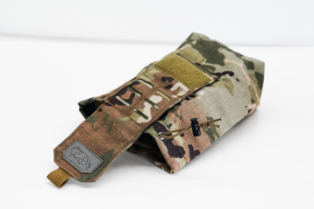 A Predator Armor Dump Pouch made of 1000D Cordura camouflage fabric with a flap closure and a metal clip on a white background.