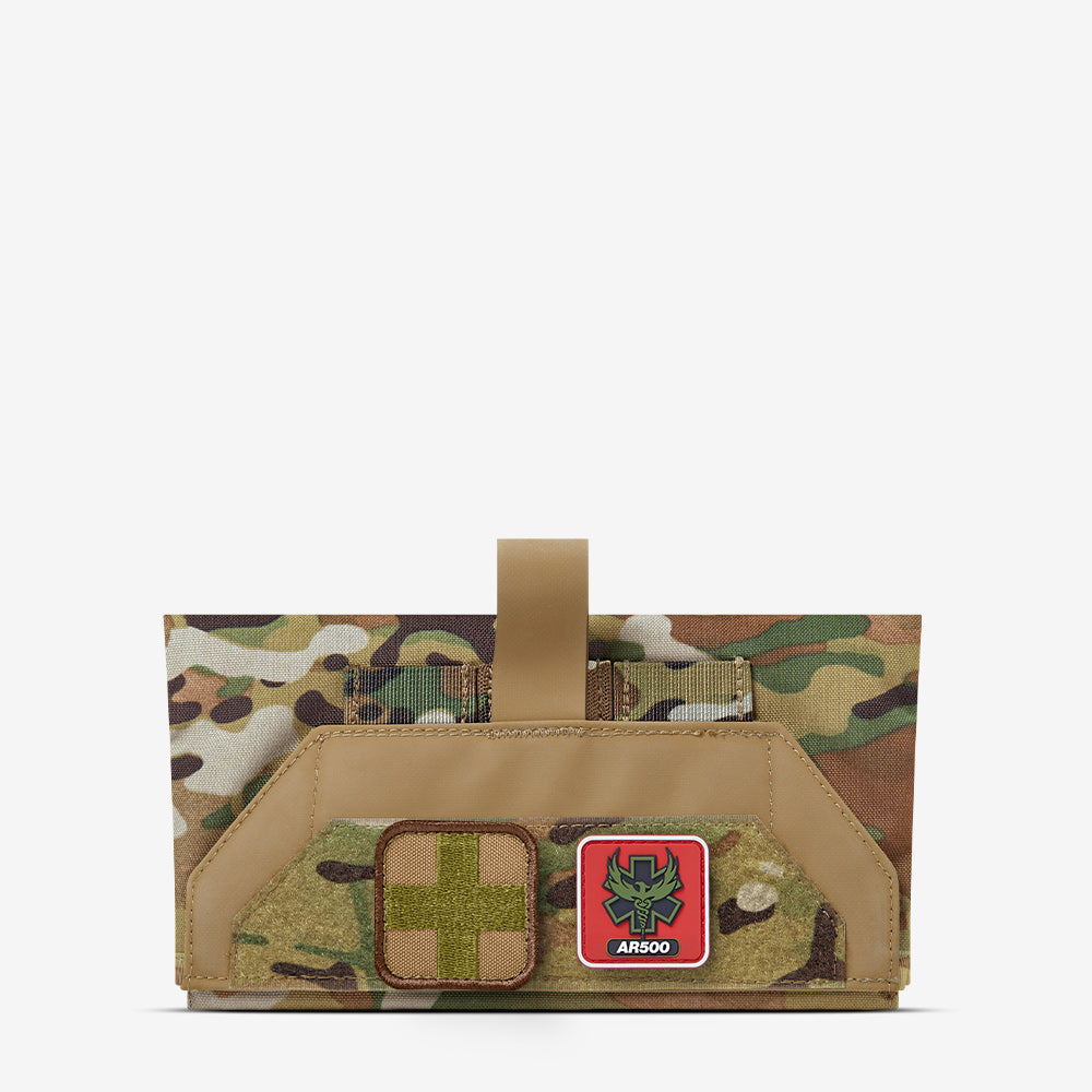 An AR500 Armor Empty Small of Back IFAK pouch with a camouflage pattern on it.