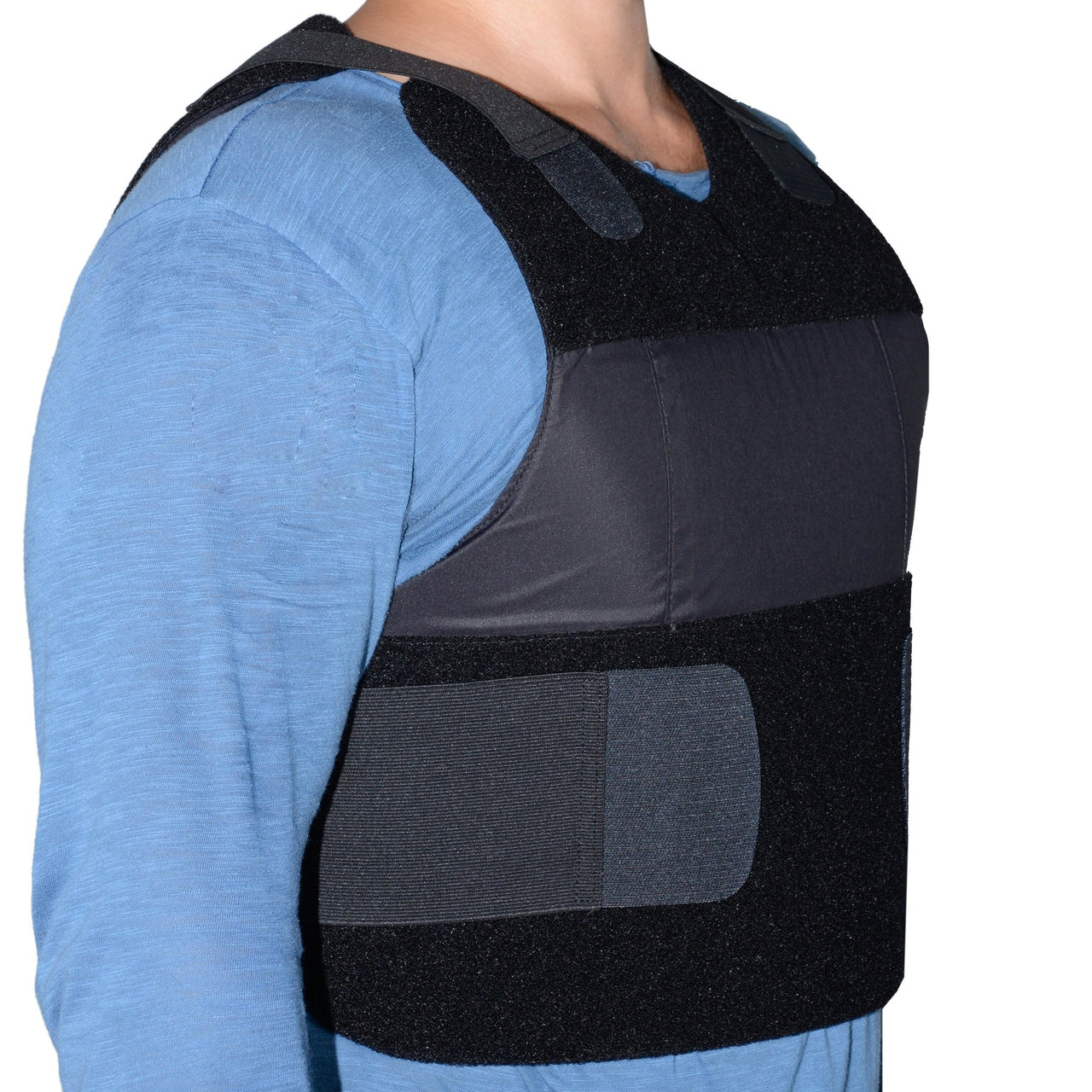A man wearing a Body Armor Direct Freedom Concealable Carrier vest.