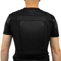 Thumbnail for Back view of a black compression concealable body armor t-shirt worn by a man on a white background