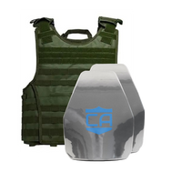 Thumbnail for The Caliber Armor AR550 III+ VISM Expert 8x10 Body Armor Package by Caliber Armor is shown with a green plate carrier behind two gray plates featuring a blue logo, highlighting advanced protection.
