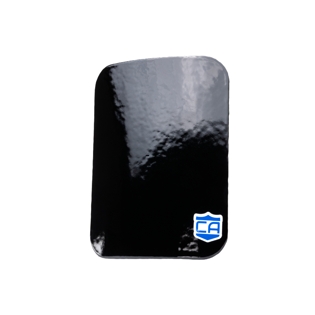 A rectangular, glossy black AR550 III+ Steel Body Armor Side Plate by Caliber Armor features a blue and white shield logo in the bottom right corner, displayed on a plain white background.