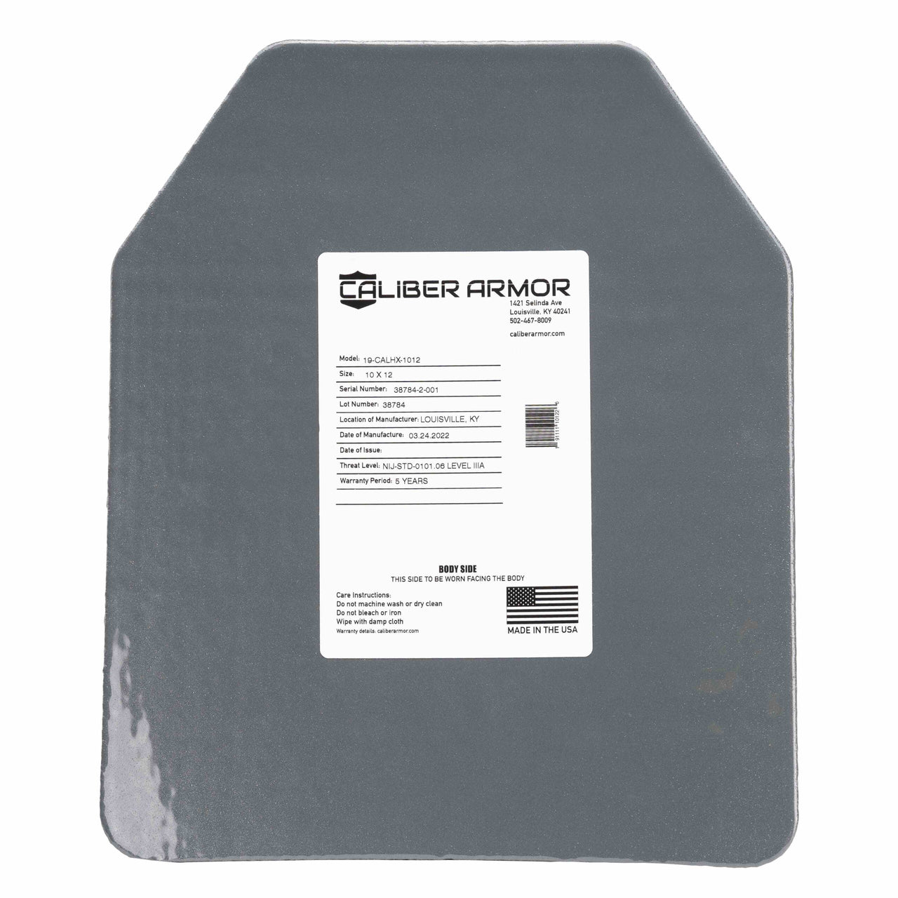 Gray rectangular CaliberHX IIIA Hard Armor Speed Plate by Caliber Armor with a white front label showing specifications and company information.