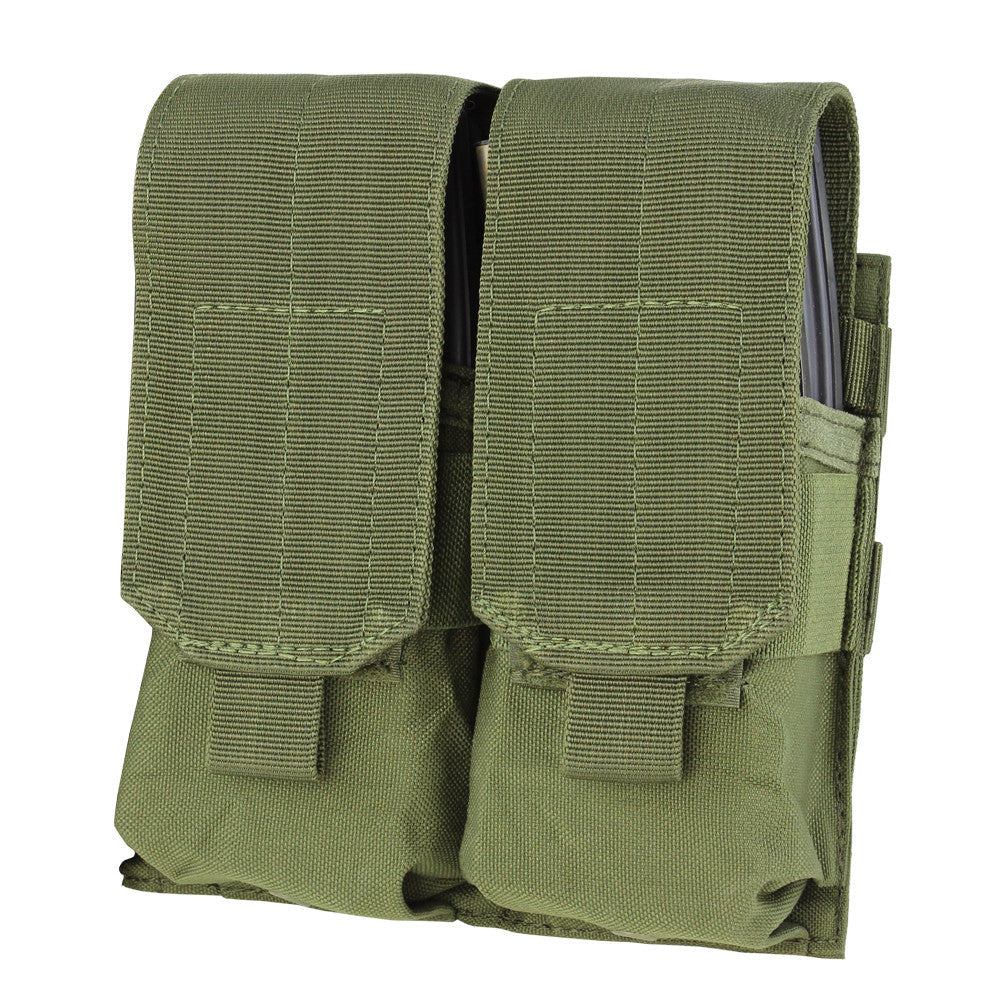 The Caliber Armor Double M4 Mag Pouch is a green, MOLLE-compatible pouch with two compartments and Velcro flaps, made from durable fabric for secure AR/M4 magazine storage.