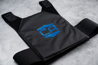 Thumbnail for The Caliber Armor CaliberX IIIA Gray Man Concealable Package, featuring soft armor panels and a blue shield logo, is shown on a gray surface.