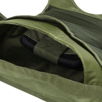 Thumbnail for Close-up of an olive green pocket on the Caliber Armor EXO PLATE CARRIER GEN II, with a Velcro flap partially open to show an interior strap and black hard armor plate.