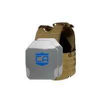 Thumbnail for The Caliber Armor Condor EXO & AR550 Level III+ Body Armor Package includes a tan tactical vest with modular webbing and a reflective silver plate featuring a blue shield with 