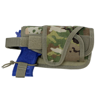 Thumbnail for A blue training pistol is partially inserted into a Caliber Armor HT Holster, featuring a camouflage pattern and Velcro straps.