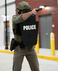 Thumbnail for Police officer holding black 15