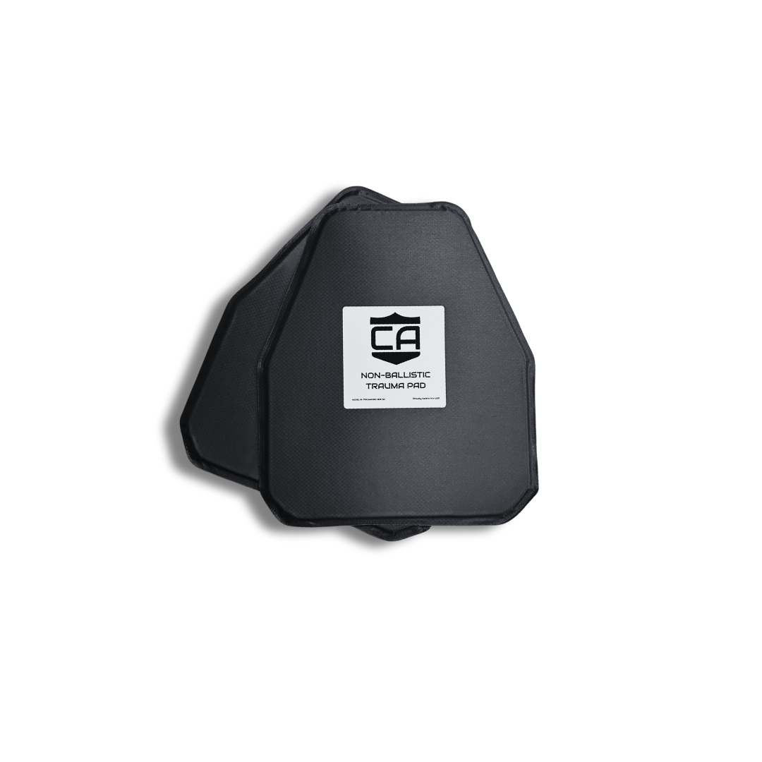 Two black, hexagonal Extreme Impact Trauma Pads by Caliber Armor are stacked, with a label reading "NON-BALLISTIC TRIVIUM PRO" and the CA logo on the top pad, placed against a white background.