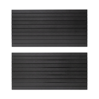 Thumbnail for Two black plastic rectangular tactical slat wall panels one of which has a small Double Tap Ind. logo cut into the surface of lower left corner,  name of panels are Assault Wall