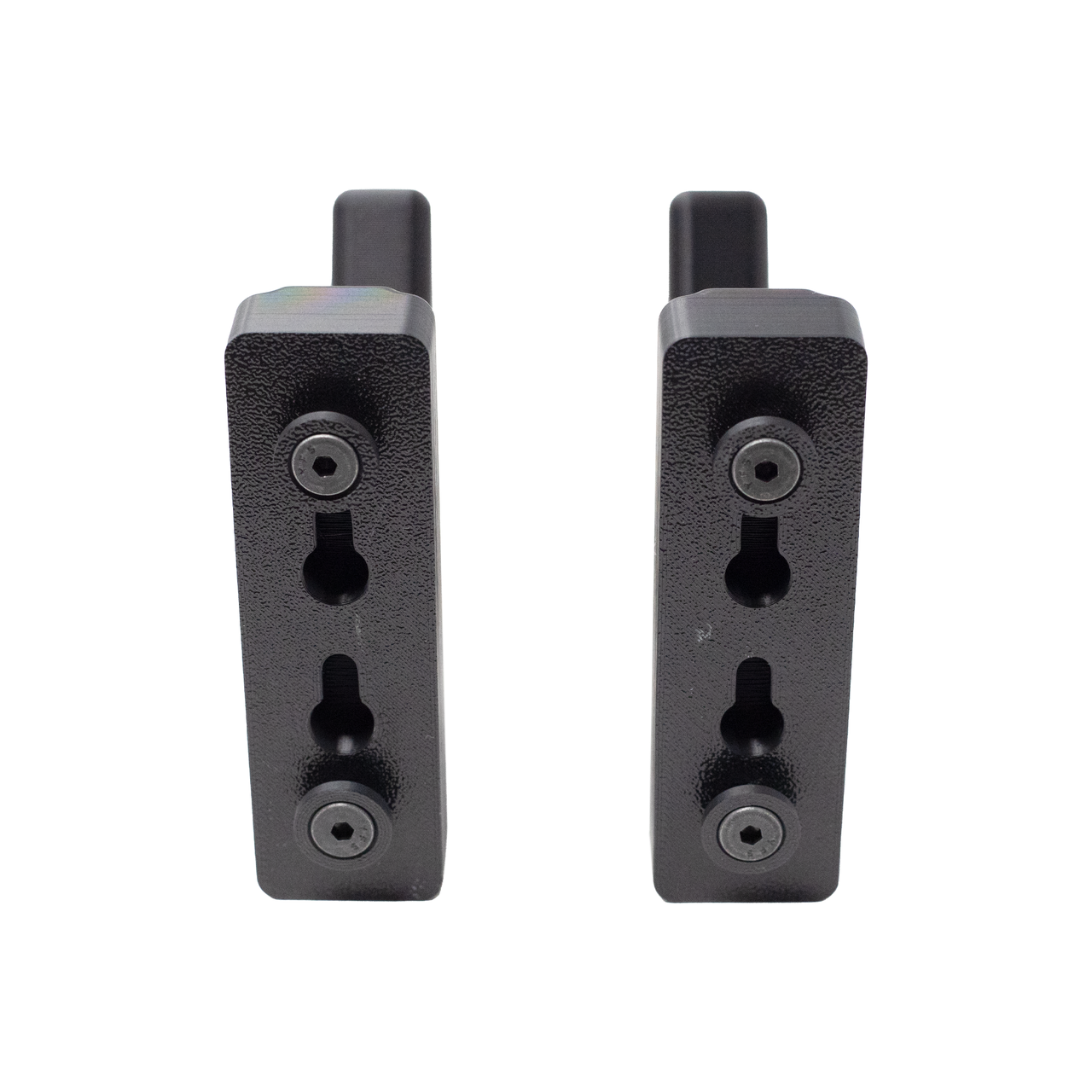 backside view of two univeral hook hangers with installed hardware that can slide in to mount to an Assault Wall tactical slat wall