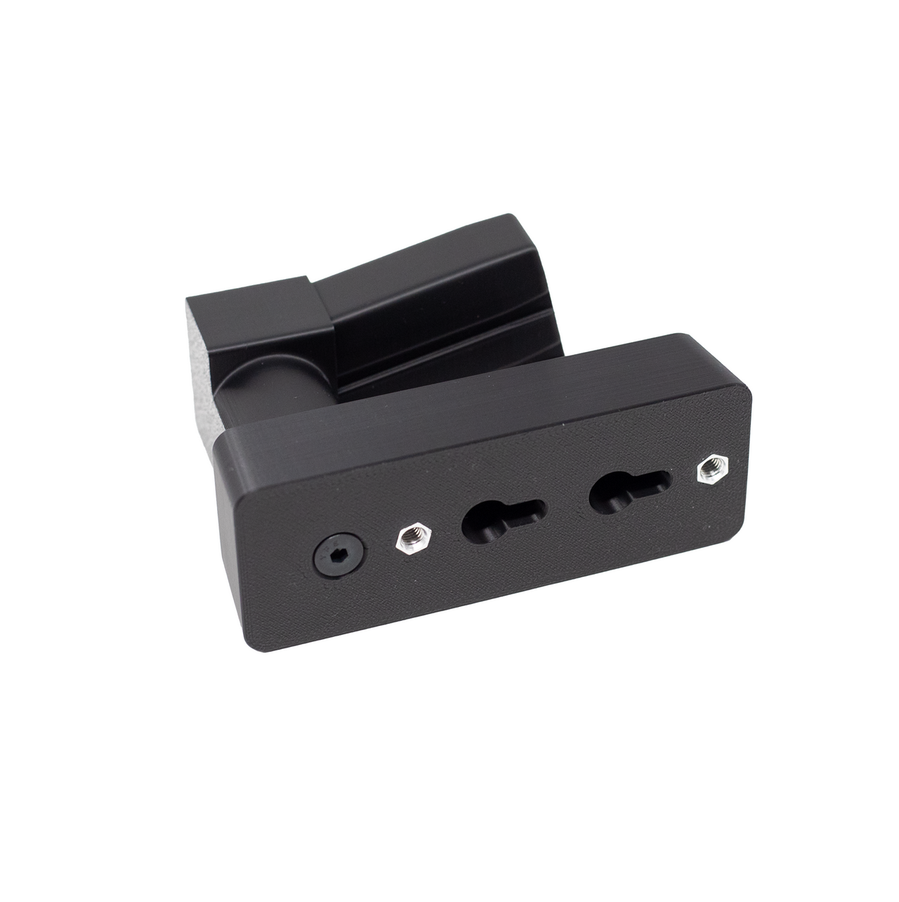 backside of magazine mounted pistol hanger showing slots for direct wall mounting on a whilte background