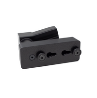 Thumbnail for backside of magazine mounted pistol hanger showing slots for assault wall slat wall mounting on a whilte background
