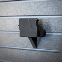 Thumbnail for Close-up of a black AK-47 rifle mount slid into position on our Assault Wall slat wall system