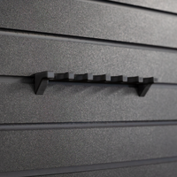 Thumbnail for Close-up of a six shotgun shell hanger without shells loaded that has been mounted to an Assault Wall tactical slat wall panel