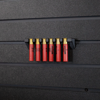 Thumbnail for Six red .410 shotgun shells hanging from a black mount that is attached to an Assault Wall tactical slat wall panel