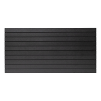 Thumbnail for Black plastic tactical slat wall panel with small Double Tap Ind. logo cut into the surface of lower left corner,  name of panel is Assault Wall