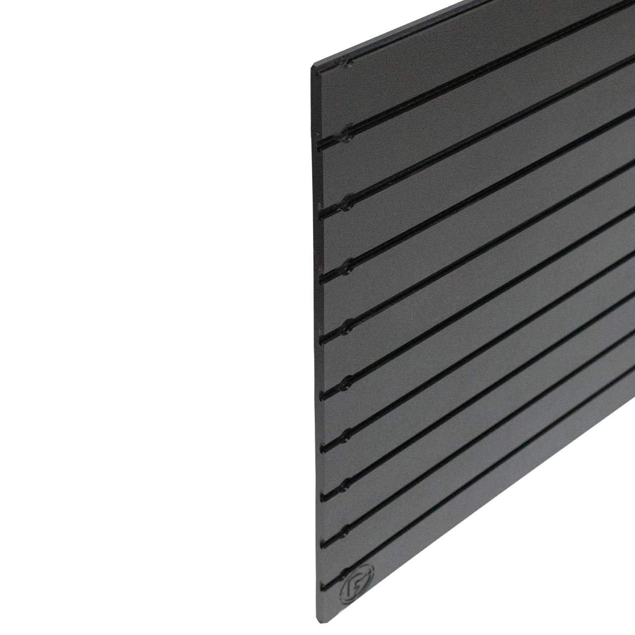 Edge profile view showing how thick the black tactical slat wall panel is, small Double Tap Ind. logo can be seen at the bottom left portion of the panel, shown on a white background
