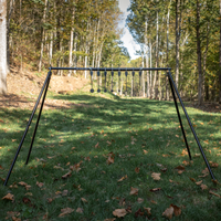 Thumbnail for Full stand view of assembled rimfire know your limits steel targets with black spacers seperating the targets evenly and locking collars on each end to keep the targets from sliding around on the crossbar