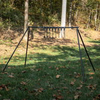 Thumbnail for angled view of heavy duty assembled rimfire know your limits steel targets with the conduit alternative tubes and conduit stand brackets in a wooded area