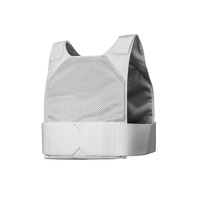 Thumbnail for The Gray Man Concealable Carrier from Caliber Armor is a gray tactical bulletproof vest with adjustable shoulder straps and breathable mesh fabric, featuring soft armor panels for protection. Shown against a plain white background.