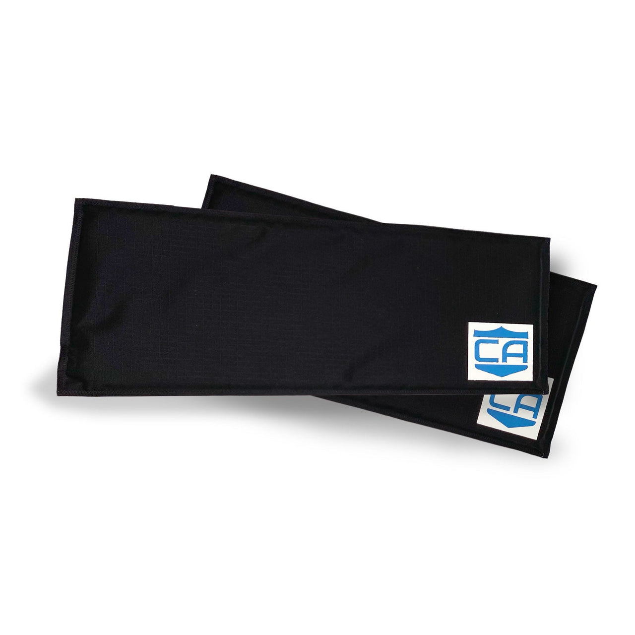Two black rectangular CaliberX Soft Armor Side Panels by Caliber Armor, made of fabric and designed for soft body armor, with a white label featuring a blue logo. The panels partially overlap on a white background—ideal plate carrier protection.