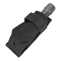 Thumbnail for A flashlight partially inserted into a black nylon Caliber Armor Flashlight Pouch with a Velcro strap, compatible with MOLLE systems.