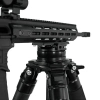 Thumbnail for m-lok-to-arca-rail-adapter-plate-attached-to-firearm-barrel-secured-to-swivel-tripod-mount