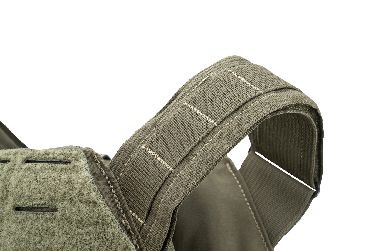 Close-up of the Caliber Armor DV8 Plate Carrier - Mini (8x10) by Caliber Armor, showing a green MIL-Spec Cordura strap with reinforced stitching and hook-and-loop fastener detail against a white background.