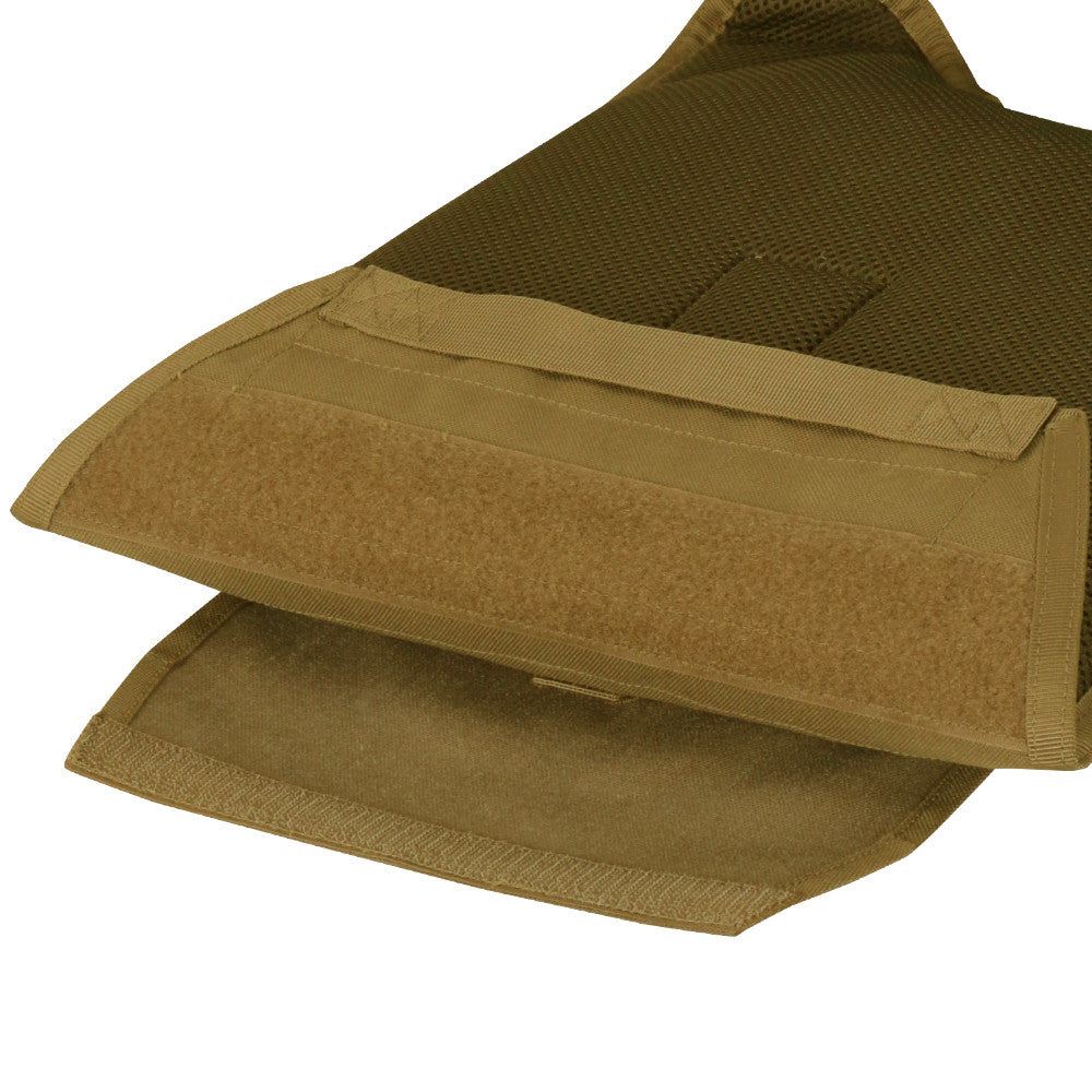 Close-up of a brown Caliber Armor CaliberX IIIA/HG2 Active Response Package vest with open Velcro flaps displaying the closure mechanism, highlighting its compatibility with lightweight body armor.