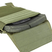 Thumbnail for A close-up of the Caliber Armor Sentry Plate Carrier, a green tactical vest with adjustable sizing, showing its open Velcro pouch that reveals a black ballistic plate inside.