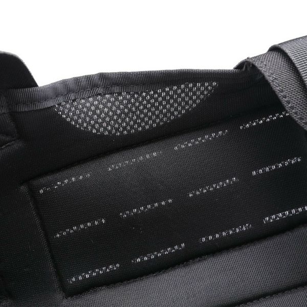 Close-up of a black Tactical Scorpion Gear Tactical Scorpion Gear- Laser Cut Dog Training Vest Harness K9 Camo MOLLE D6 fabric texture with a mesh pattern and horizontal reflective stripes.