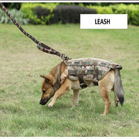 Thumbnail for A dog in a camouflage coat on a Tactical Scorpion Gear - Leash Canine Dog K9 Camo Military Training Vest Harness sniffs the ground.